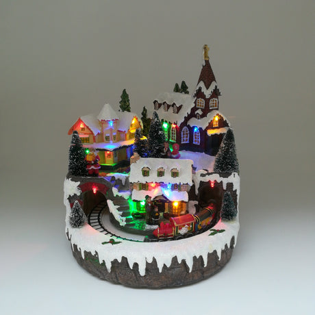 Villaggio con Chiesetta e Treno che Passa nel Tunnel Paesaggi e Scene Natalizie Garden Team