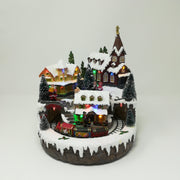 Villaggio con Chiesetta e Treno che Passa nel Tunnel Paesaggi e Scene Natalizie Garden Team