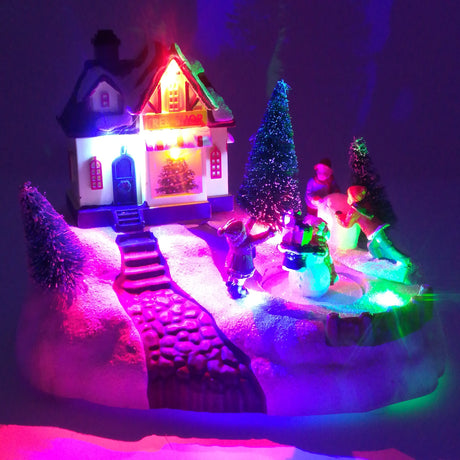 Villaggio con Scena Pupazzo di Neve che Gira Paesaggi e Scene Natalizie Garden Team